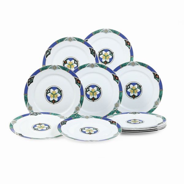 Dodici piatti piani Dioricis.<BR>Francia, Manifattura di Limoges per Christian Dior, 1960-1970 circa.<BR>  - Asta  Arredi per la tavola - Associazione Nazionale - Case d'Asta italiane