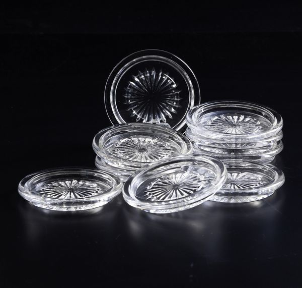 Dodici sottobicchieri.<BR>Francia, Manifattura Baccarat, secondo quarto del XX secolo.<BR>  - Asta  Arredi per la tavola - Associazione Nazionale - Case d'Asta italiane