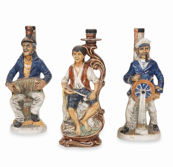 Tre bottiglie scultoree.<BR>Italia, anni '70 del Novecento.<BR>  - Asta  Arredi per la tavola - Associazione Nazionale - Case d'Asta italiane