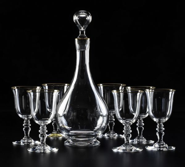 Diciotto calici e una bottiglia Annie.<BR>Francia, Manifattura Baccarat, XX secolo.<BR>  - Asta  Arredi per la tavola - Associazione Nazionale - Case d'Asta italiane