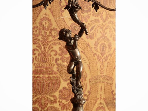 Coppia di candelabri in argento  - Asta Un'antica dimora marchigiana: Arredi antichi e Arte contemporanea - Associazione Nazionale - Case d'Asta italiane