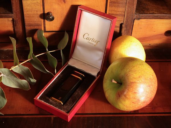 Accendino Cartier  - Asta Un'antica dimora marchigiana: Arredi antichi e Arte contemporanea - Associazione Nazionale - Case d'Asta italiane