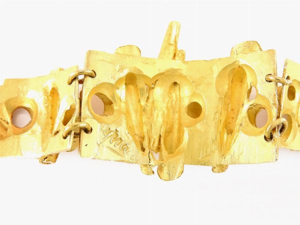 Bracciale a tre piastre in oro giallo Ubert Piacco (1912-1978)  - Asta Orologi e Gioielli - I - Associazione Nazionale - Case d'Asta italiane