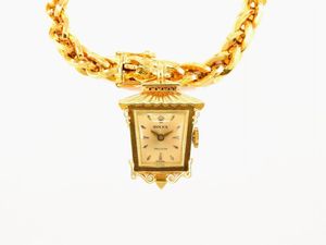 Bracciale con pendente orologio Rolex in oro giallo  - Asta Orologi e Gioielli - I - Associazione Nazionale - Case d'Asta italiane