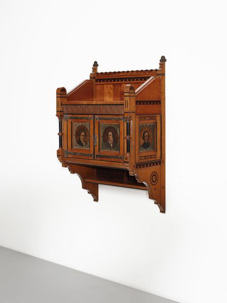 ISSEL ALBERTO (1848 - 1926) : attribuito. Piccolo stipo pensile con fronti decorati con mezzi busti di Mozart, Beethoven, Rossini e Mendelssohn  - Asta Asta 523 | DESIGN E ARTI DECORATIVE DEL NOVECENTO Tradizionale - Associazione Nazionale - Case d'Asta italiane