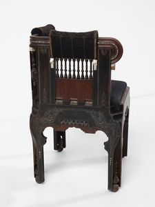 QUARTI EUGENIO (1867 - 1929) : Poltroncina angolare Neo-Orientalista  - Asta Asta 523 | DESIGN E ARTI DECORATIVE DEL NOVECENTO Tradizionale - Associazione Nazionale - Case d'Asta italiane