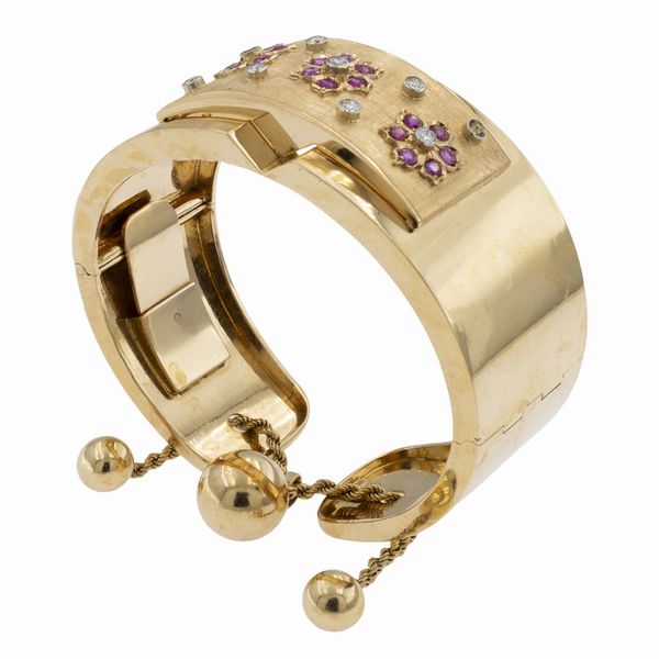 Bracciale a manetta in oro giallo liscio e satinato 18kt  - Asta Gioielli e Orologi - Associazione Nazionale - Case d'Asta italiane