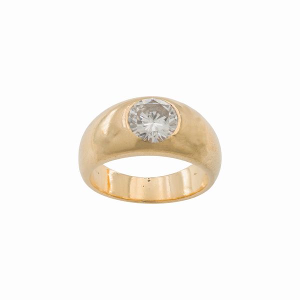 Anello in oro giallo 18kt con un diamante naturale  - Asta Gioielli e Orologi - Associazione Nazionale - Case d'Asta italiane