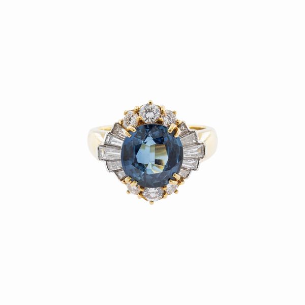Anello in oro giallo 18kt con zaffiro naturale e diamanti  - Asta Gioielli e Orologi - Associazione Nazionale - Case d'Asta italiane