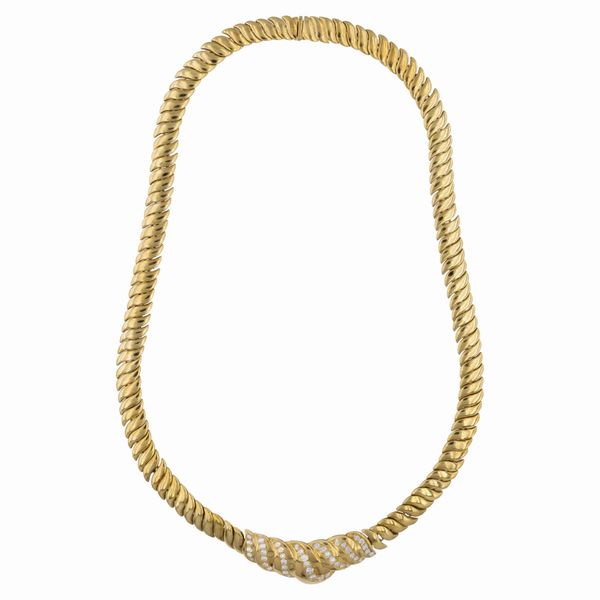 Collana onde in oro giallo 18kt e diamanti  - Asta Gioielli e Orologi - Associazione Nazionale - Case d'Asta italiane