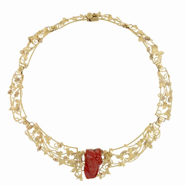 Collana in oro giallo 18kt lavorato a tralci di vite  - Asta Gioielli e Orologi - Associazione Nazionale - Case d'Asta italiane