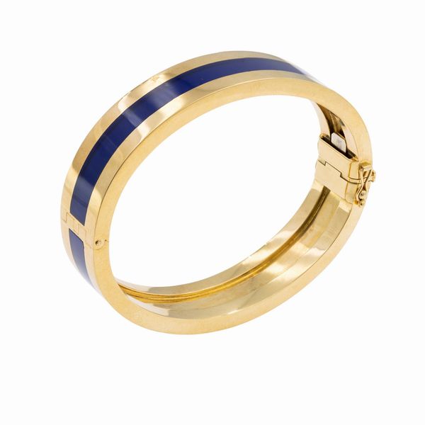 Bracciale a manetta in oro giallo 18kt e smalto blu  - Asta Gioielli e Orologi - Associazione Nazionale - Case d'Asta italiane