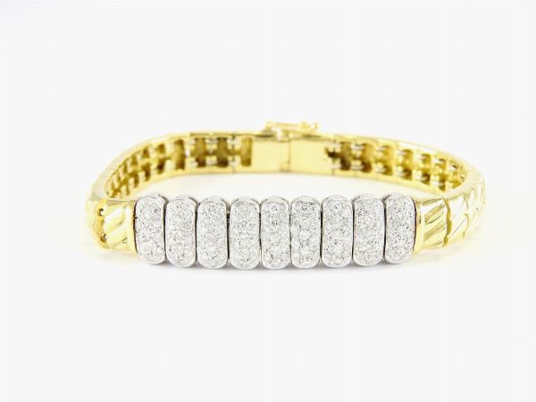Bracciale in oro giallo e bianco con diamanti  - Asta Gioielli - II - Associazione Nazionale - Case d'Asta italiane