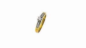 ANELLO - Peso gr 4 0 Misura 15 in oro giallo e bianco con diamante solitario taglio brillante di ct 0 13 ca e diamantini  [..]
