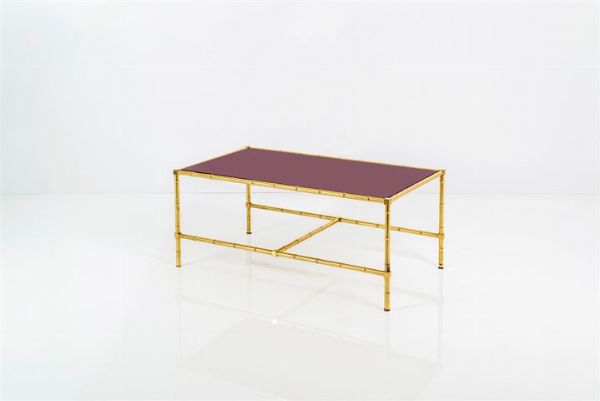 MAISON BAGUES : Tavolino con struttura in ottone lucido modellato a canna di bamboo  piano in vetro. Anni '50 cm 50x115x64  - Asta Design - Associazione Nazionale - Case d'Asta italiane