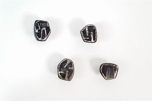 CERRATO VICTOR Cunico d'Asti (AT) 1917 - 2008 Torino - Quattro attaccapanni in ceramica di forme e decori diversi. Supporti in metallo. Misure diverse. Bibl.: Esemplari  [..]