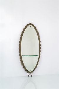 CRISTAL ART - Specchiera con cornice in vetro colorato  sagomato e specchiato  mensola in vetro di forte spessore. Anni '60  [..]