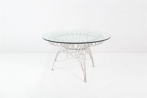 PRODUZIONE ITALIANA - Tavolo da giardino in tondino di ferro verniciato  piano in vetro molato. Anni '50 cm 75x130