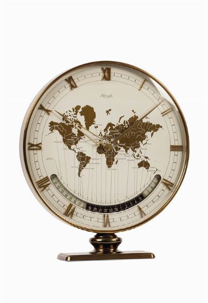 KIENZLE : KIENZLE, World Time gilt brass Desk Clock, orologio in ottone dorato, con ore del mondo, apertura per le 24 ore e indicazione del giorno e della notte. Realizzato nel 1950 circa  - Asta Orologi da Polso e da Tasca - Associazione Nazionale - Case d'Asta italiane
