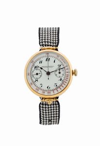 NATIONAL WATCH - NATIONAL WATCH, La Chaux-de-Fonds. Raro, orologio da polso in oro giallo 18K con monopulsante cronografico ad ore 6, scala tachimetrica. Realizzato nel 1930.