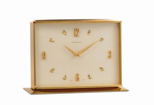 TIFFANY - TIFFANY&Co., orologio da tavolo, riserva 8 giorni, in ottone dorato. Realizzato nel 1960 circa