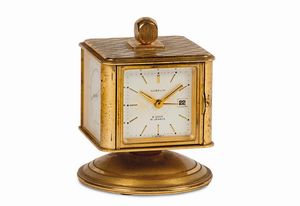 GUBELIN - GUBELIN, No. 5044, orologio a forma di cubo, girevole in ottone dorato,  8 giorni di carica  con datario, igrometro, barometro e termometro. Realizzato nel 1960 circa