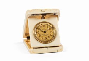 W.BARRET&SON - W.BARRET&SON, 9 Old Bond Street, London W1, piccolo orologio da viaggio in avorio e argento con riserva di carica 8 giorni. Realizzato nel 1920 circa
