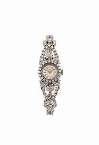 LONGINES - LONGINES, elegante, orologio da signora, in oro bianco 18K con brillanti e bracciale in oro bianco. Realizzato nel 1960 circa