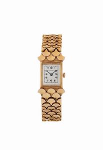 LONGINES - LONGINES, elegante, orologio da polso, da signora in oro giallo 18K con bracciale a squame di serpente. Realizzato nel 1960 circa