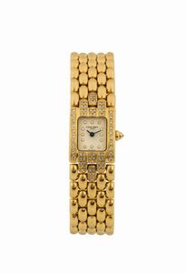 CHAUMET - CHAUMET, Paris, orologio da polso, da signora, impermeabile, in oro giallo 18K e brillanti con bracciale in oro e chiusura deployante. Realizzato nel 2000 circa