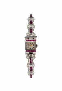 JUSTA - JUSTA, orologio da signora in platino  e rubini con bracciale in oro bianco 18K. Realizzato nel 1920 circa