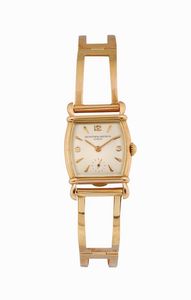 VACHERON CONSTANTIN - VACHERON &CONSTANTIN, Geneve, Ref.4238, orologio da polso, di forma, in oro giallo 18K con bracciale in oro. Realizzato nel 1950 circa
