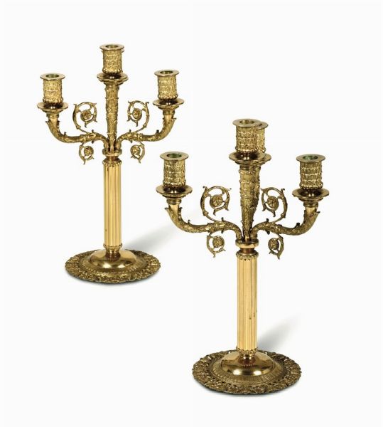 Coppia di candelabri in bronzo dorato a 4 fuochi stile Impero  - Asta Antiquariato - Associazione Nazionale - Case d'Asta italiane