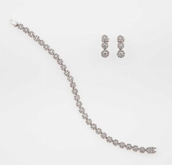 Bracciale ed orecchini con diamanti taglio brillante per ct 5,16 totali  - Asta Fine Jewels - Associazione Nazionale - Case d'Asta italiane