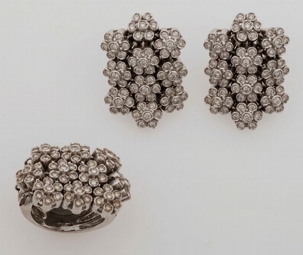 Demi-parure composta da anello ed orecchini con diamanti  - Asta Fine Jewels - Associazione Nazionale - Case d'Asta italiane
