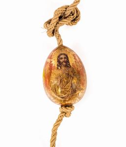 ICONA - H. cm 12 Eseguita su uovo in legno dorato con l'immagine del Cristo pantocratore Tecnica mista su legno  fondo  [..]