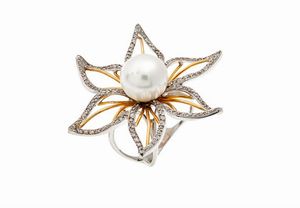 ANELLO - Peso gr 13 6 Misura14 in oro bianco  sommit a fiore  con petali in diamanti taglio brillante per totali ct 1  [..]