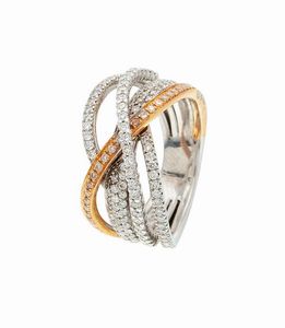 ANELLO - Peso gr 8 1 Misura12 in oro bianco e rosa  sommità a fili intrecciati  con diamanti taglio brillante per totali  [..]