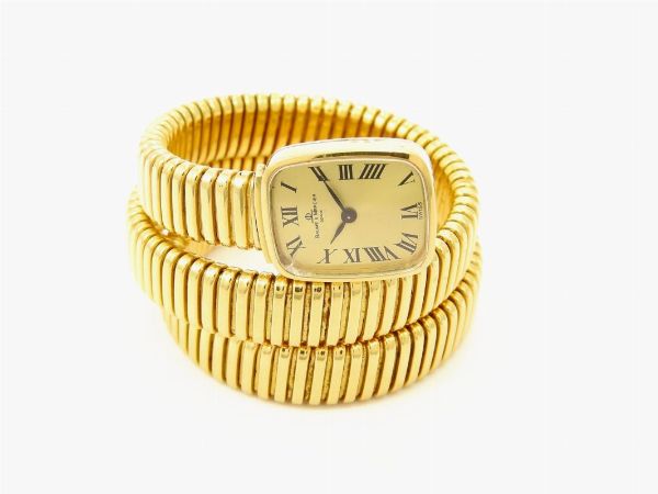 Bracciale tubogas in oro giallo Weingrill con orologio Baume & Mercier  - Asta Gioielli - II - Associazione Nazionale - Case d'Asta italiane