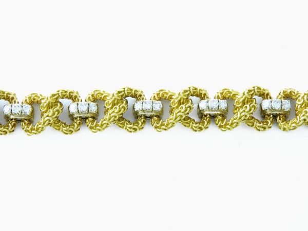 Bracciale Pomellato in oro giallo e bianco con diamanti  - Asta Gioielli - II - Associazione Nazionale - Case d'Asta italiane