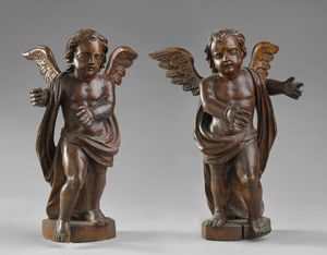 SCULTORE VENETO DEL XVIII SECOLO - Coppia di angeli in legno scolpito.