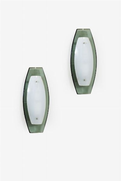 CRISTAL ART : Coppia di appliques  in vetro curvato colorato. Anni '60 lung cm 32  - Asta Design - Associazione Nazionale - Case d'Asta italiane