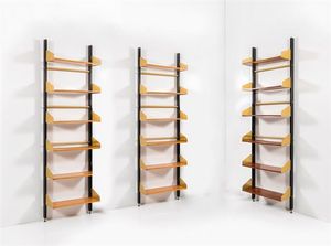 FEAL - Tre librerie con montanti in metallo  ripiani in legno di teak regolabili in altezza. Anni '60 cm 268x83x24