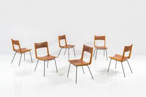 RATTI CARLO - Sei sedie con struttura in legno  imbottitura rivestita in skai  gambe in metallo con terminali in ottone. Anni  [..]