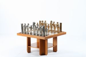 ROCCAMONTE AMELIO (n. 1927) - Tavolo a scacchiera e scacchi