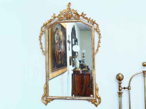 Coppia di specchiere in legno intagliato e dorato  - Asta House sale: Arte e Design da villa 