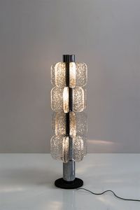 MAZZEGA - Lampada in acciaio cromato e elementi in vetro di forte spessore. Prod. Mazzega anni '70 h cm 130