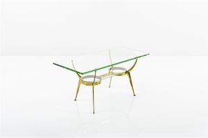 PRODUZIONE ITALIANA - Tavolino con struttura in ottone  piano in cristallo molato. Anni '50 cm 45 5x101x45