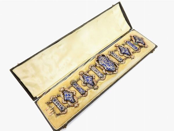Bracciale in oro giallo e argento con smalti blu  - Asta Gioielli e Orologi - II - Associazione Nazionale - Case d'Asta italiane