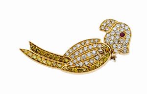 POMELLATO - Peso gr 9 3 Spilla in oro giallo e bianco  firmata Pomellato  a forma di pappagallo con pav di diamanti taglio  [..]